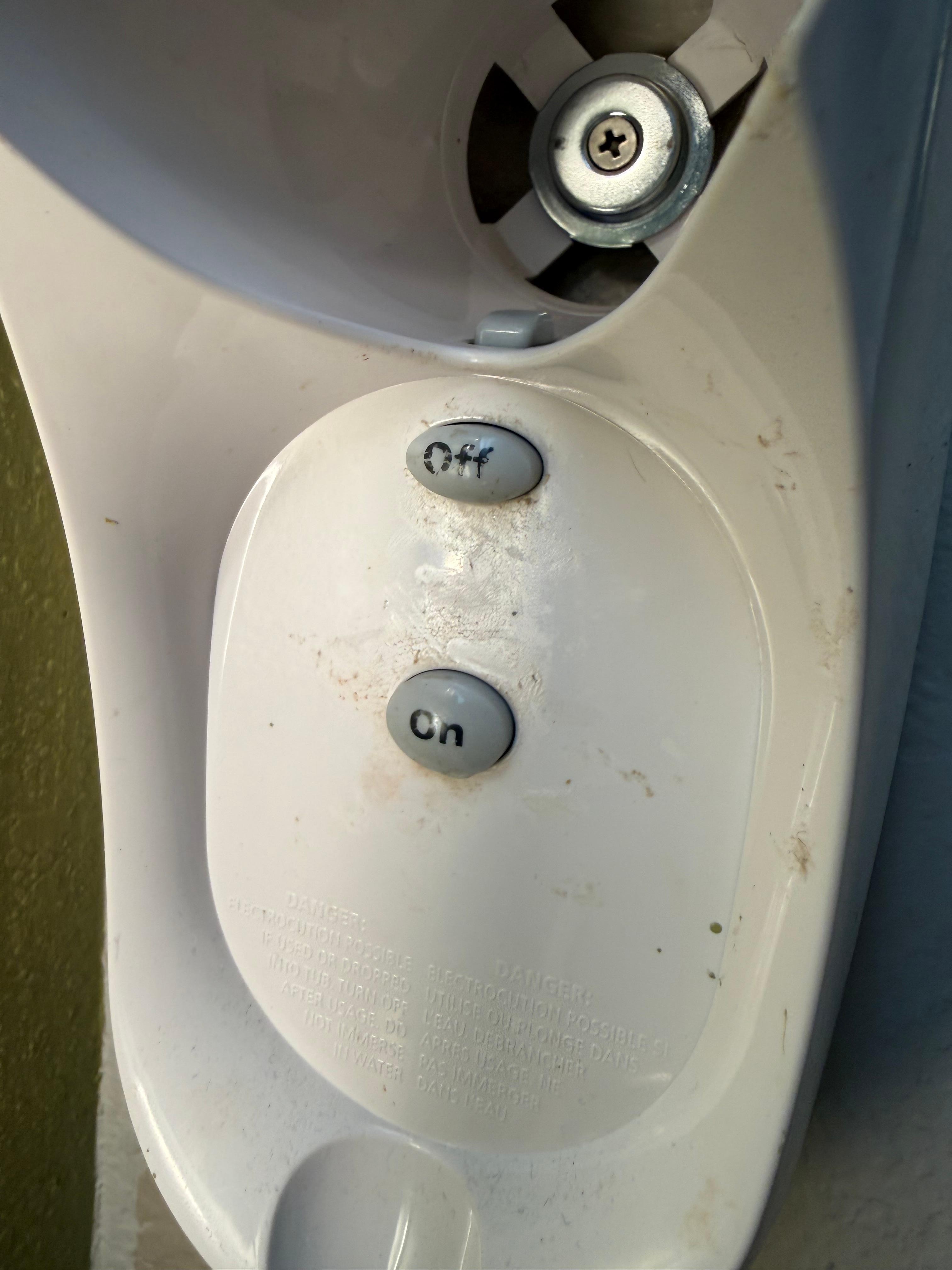 Hairdryer wall mounted holder