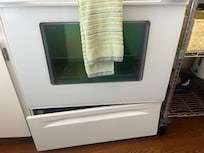 Busted bottom drawer on stove