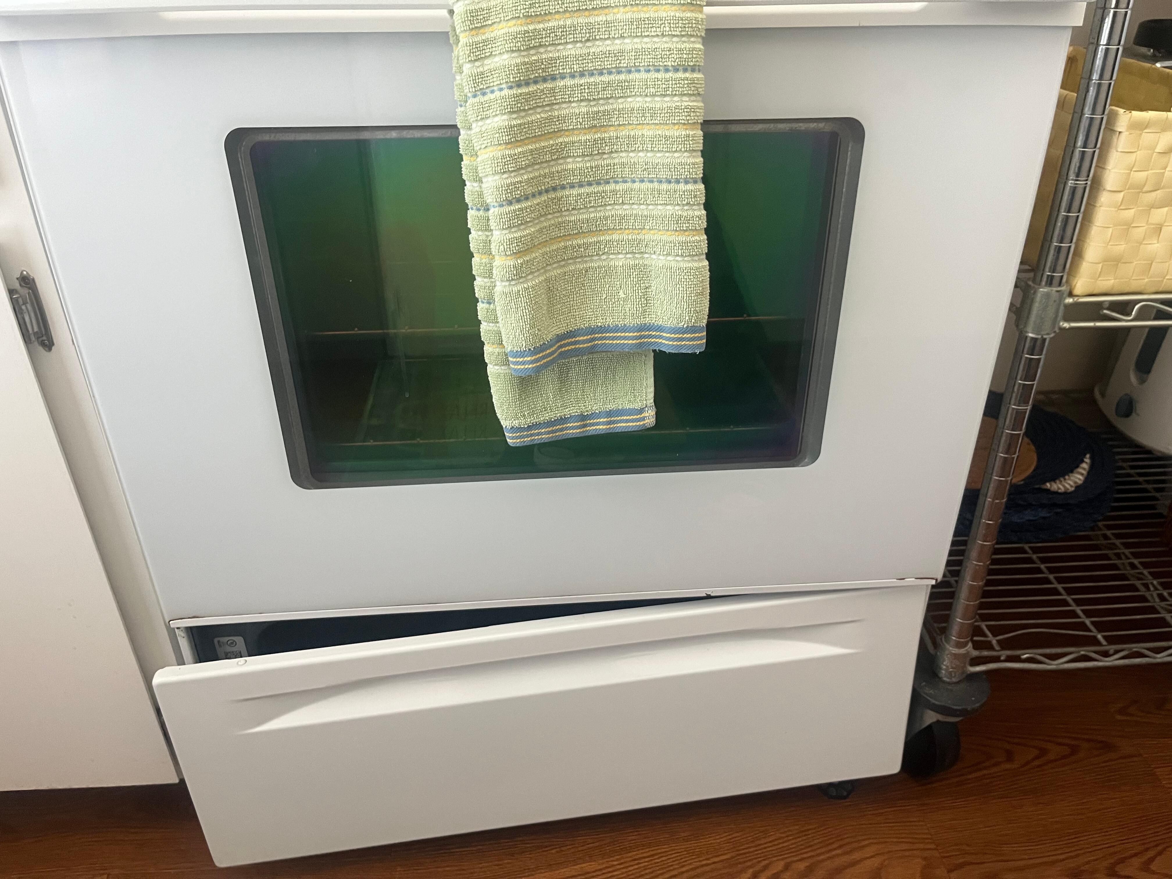 Busted bottom drawer on stove