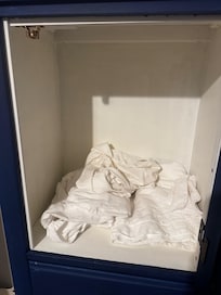 The cabinet inside the closet was just a mess.