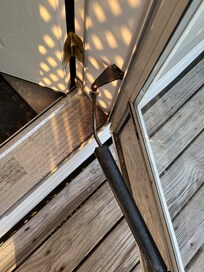 Broken pneumatic storm door closer