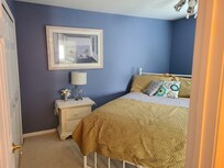 Main bedroom with tub/shower bathroom