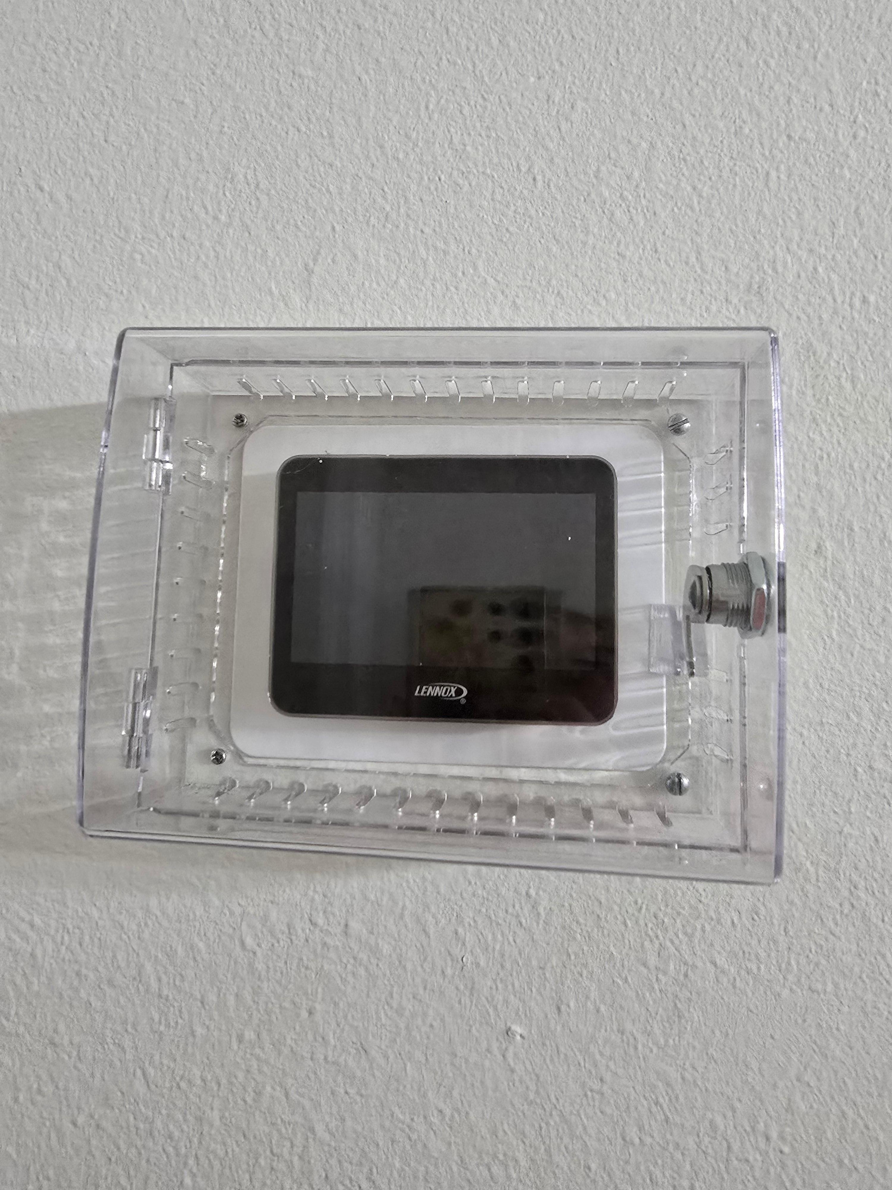 The thermostat in a locked box with no ability to change the temperature. 