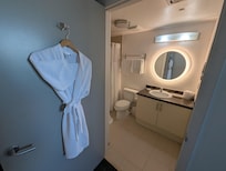 Bathroom in room pretending to wash coffee cups in the bathroom sink! NO KITCHEN AS ADVERTISED!!! NO COMMUNICATION! NOBODY CARED TO ADDRESS THE ISSUE!