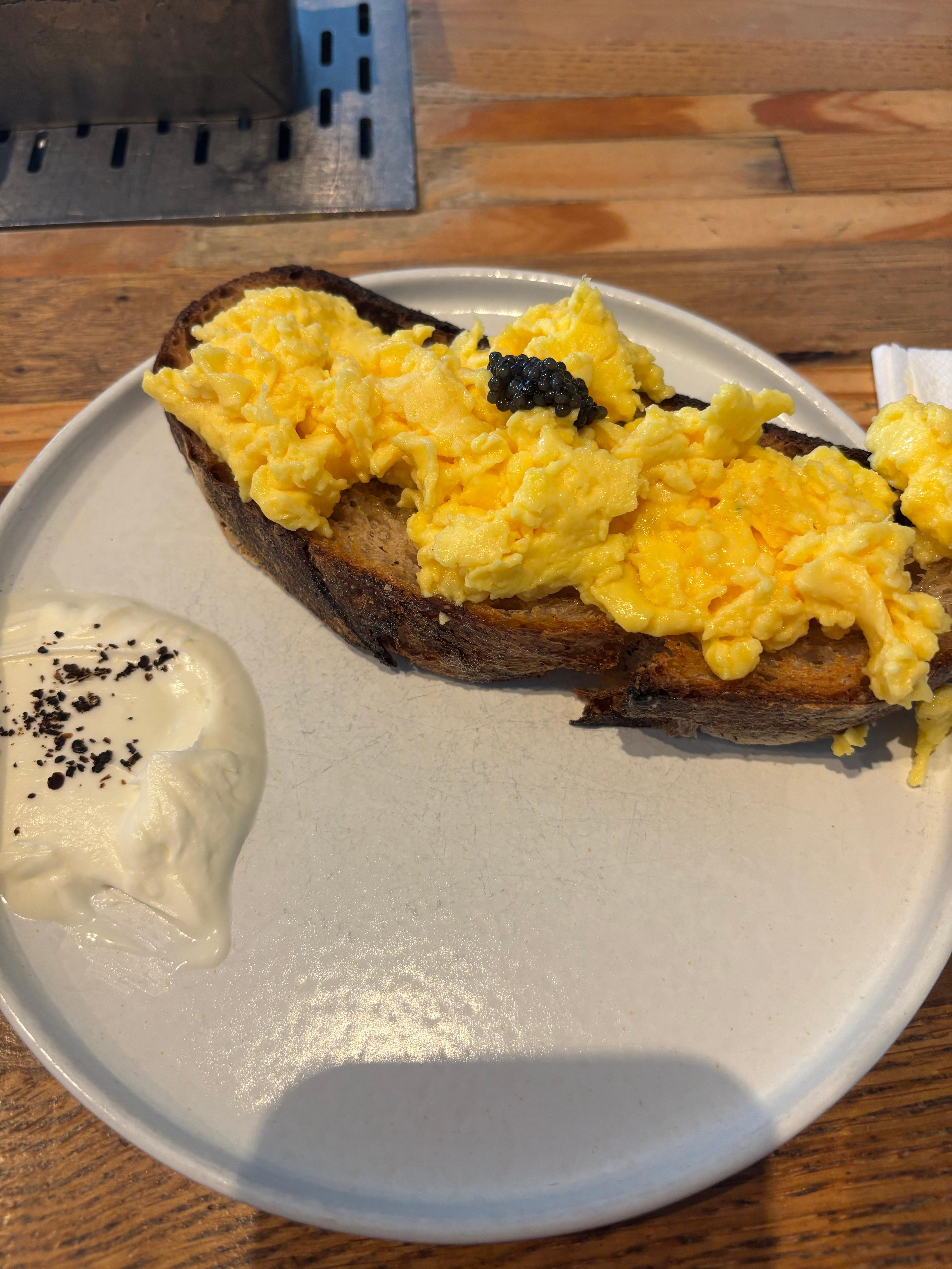 One of the hot food options for the enhanced Friday/Saturday breakfast - scrambled eggs on sourdough toast, with caviar and crème fraiche.