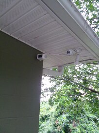 Security cameras everywhere outside, with a sign that said 24 surveillance. Strong lights come on at night lighting up the bedroom and no way to turn them off to sleep.