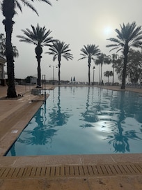 Pool by gym and golf course