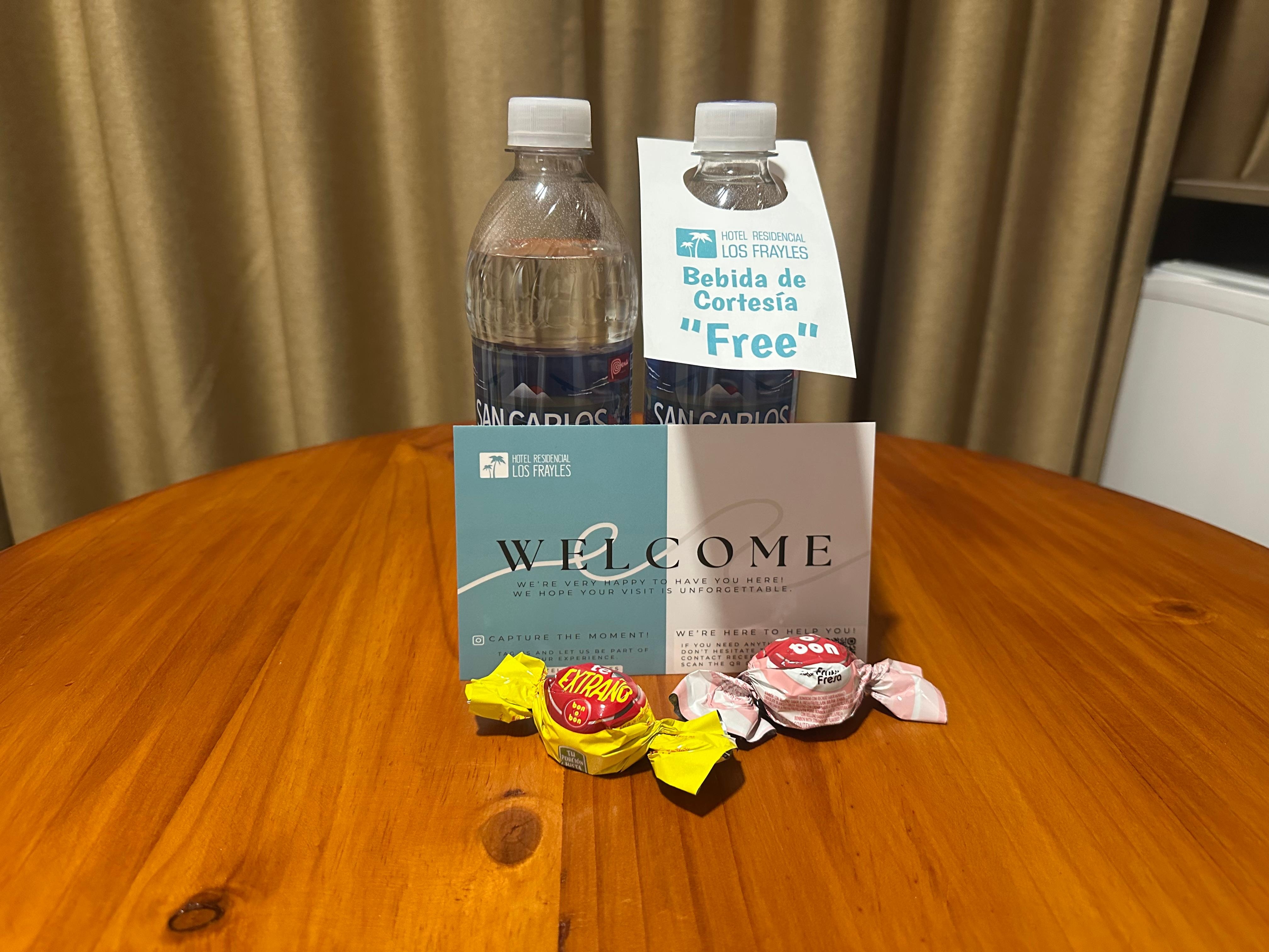 Complimentary water and bonbons