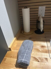 Less than half a roll of paper towels, and just a few napkins. It made it hard to clean. The one dishtowel helped.