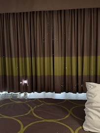 Holes in curtains.