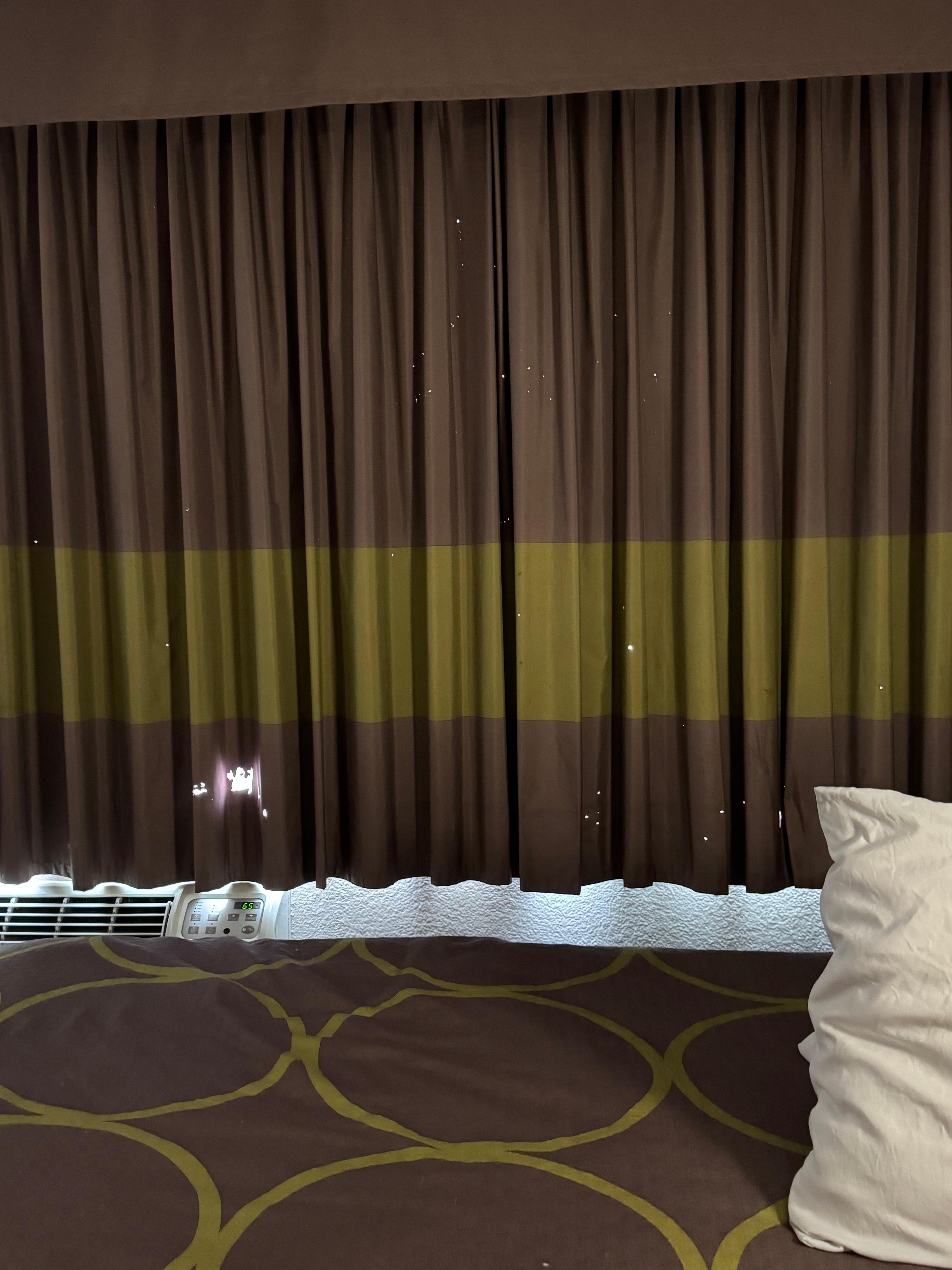 Holes in curtains.