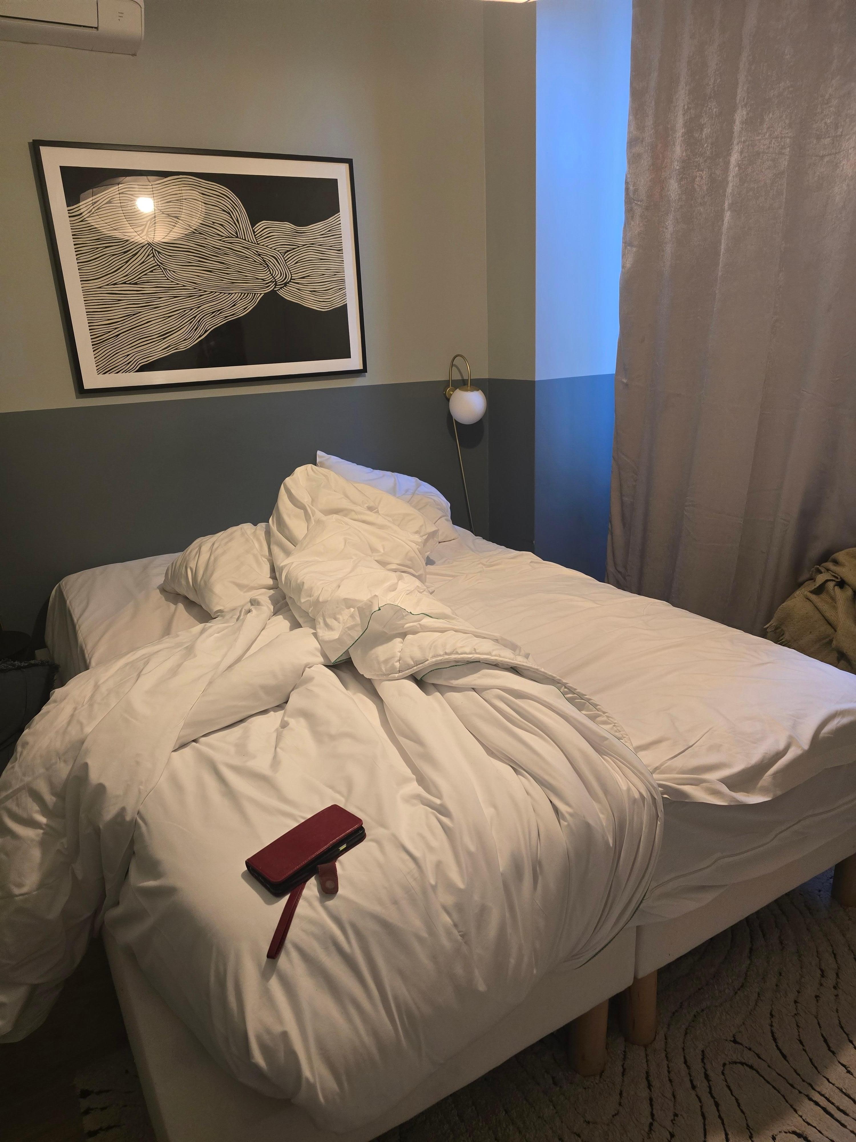 NOT a king-size bed. Barely a queen. Mattress on top is smaller than frame.