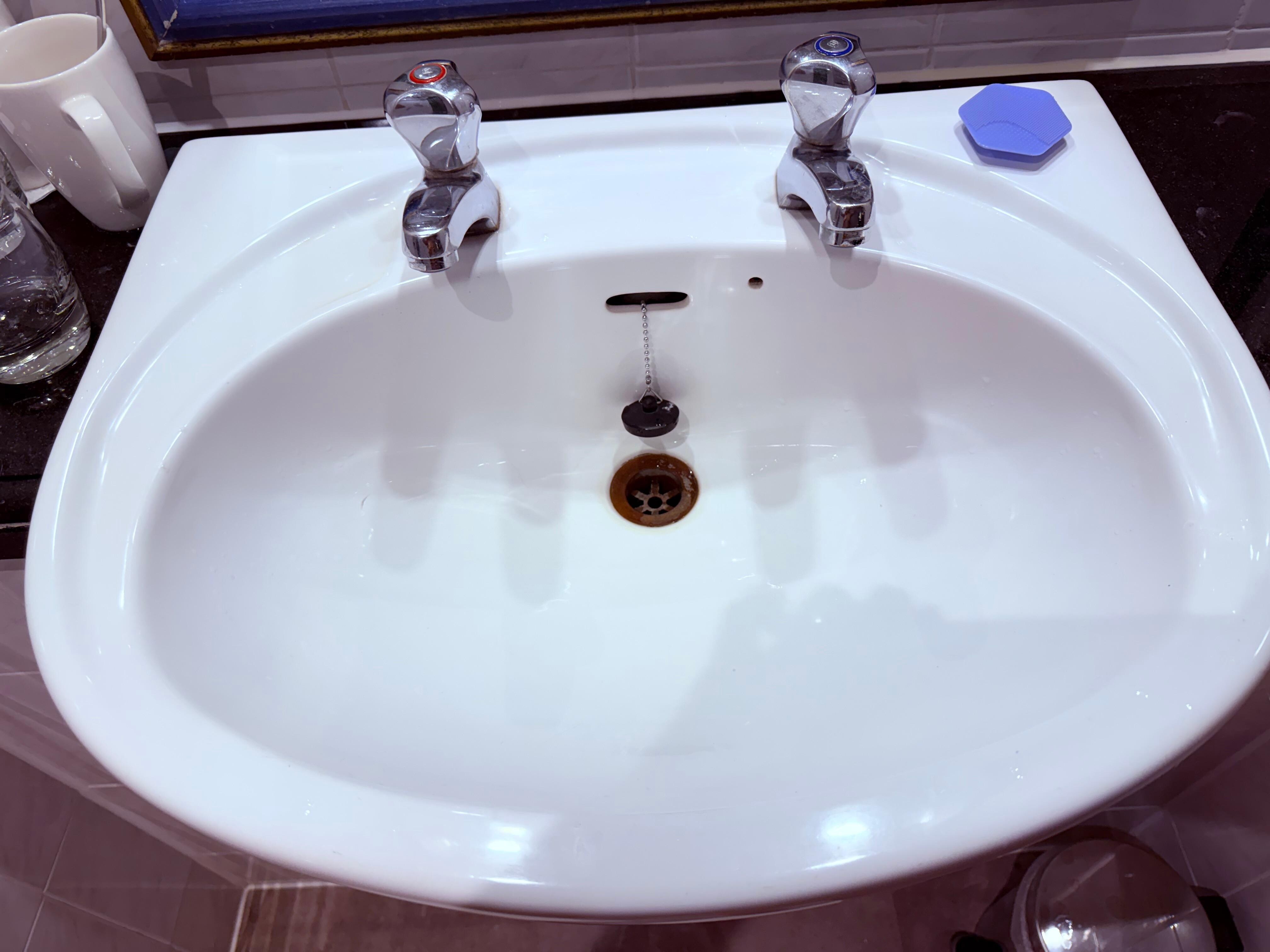 sink drain plug will not reach drain