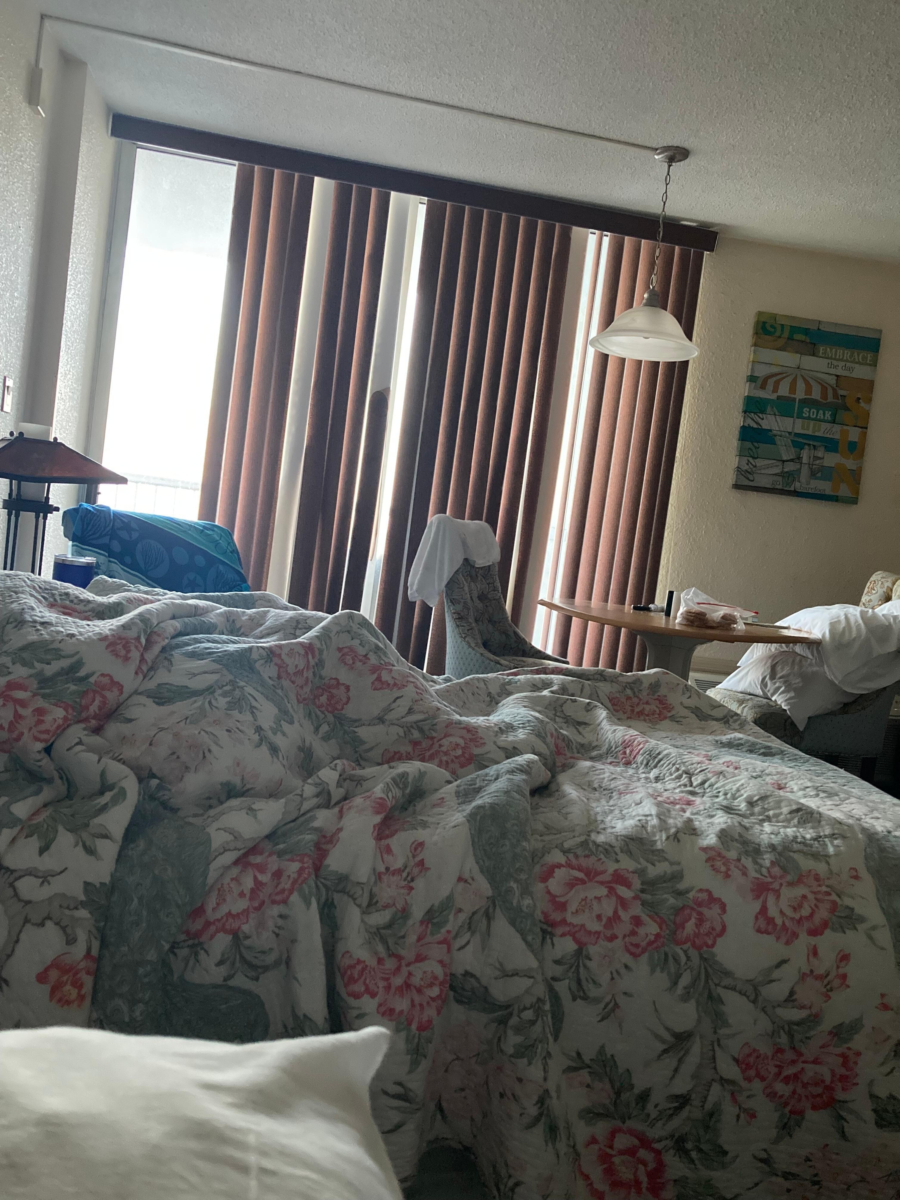 Picture taken at 6:00a. Unable to sleep-in as slats were broken making room too bright.