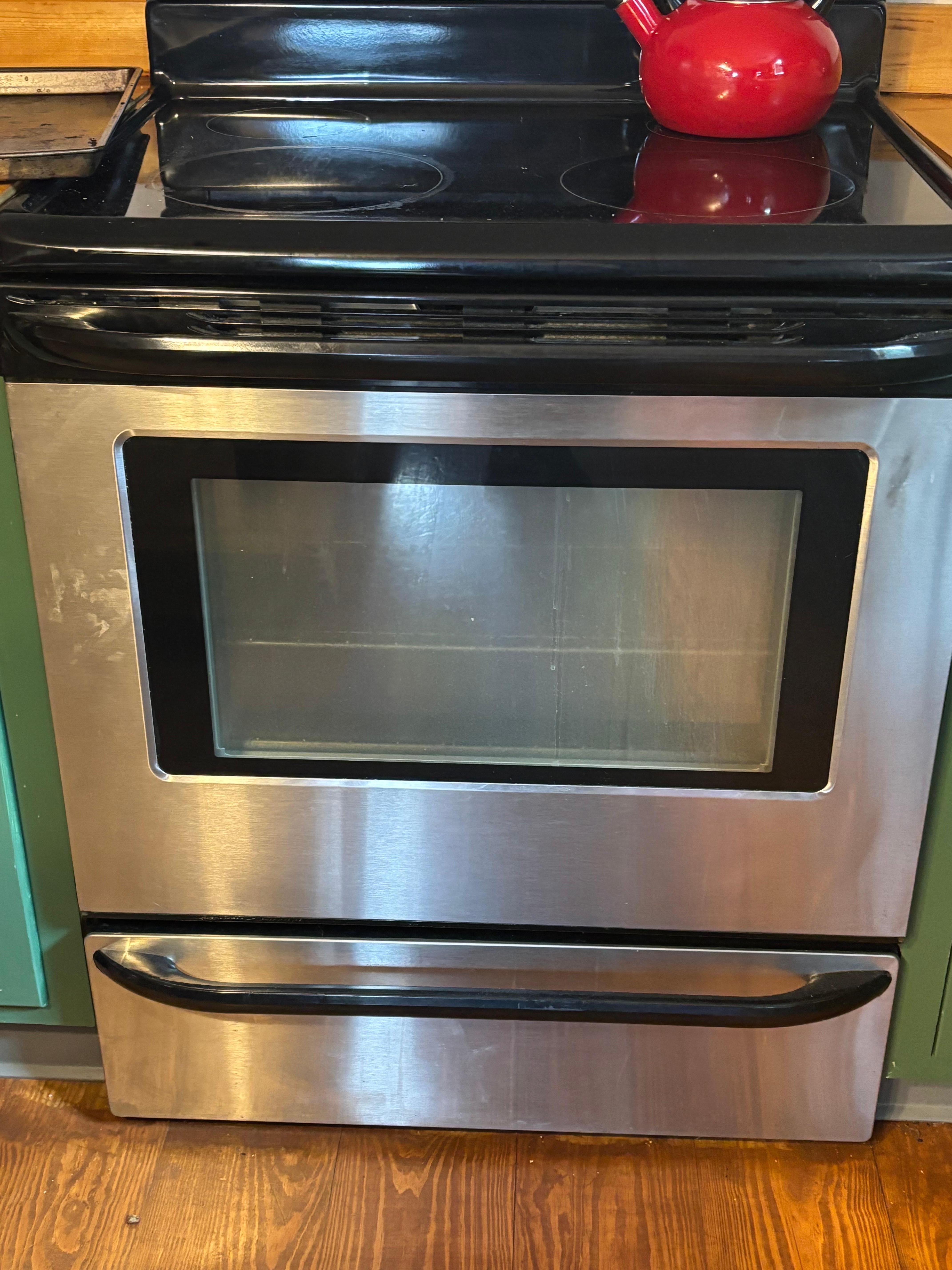 Finger printed stove from previous guests