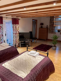 Twin beds on ground floor with a bathroom off from the room