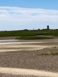 Lighthouse on other side of seawalk