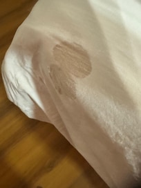 I don’t know how the did not see this big stain when making the bed