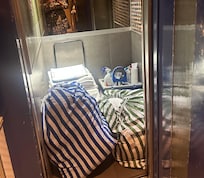 They the same elevator as guests for their use and they put guests towels and sheets on the floor.