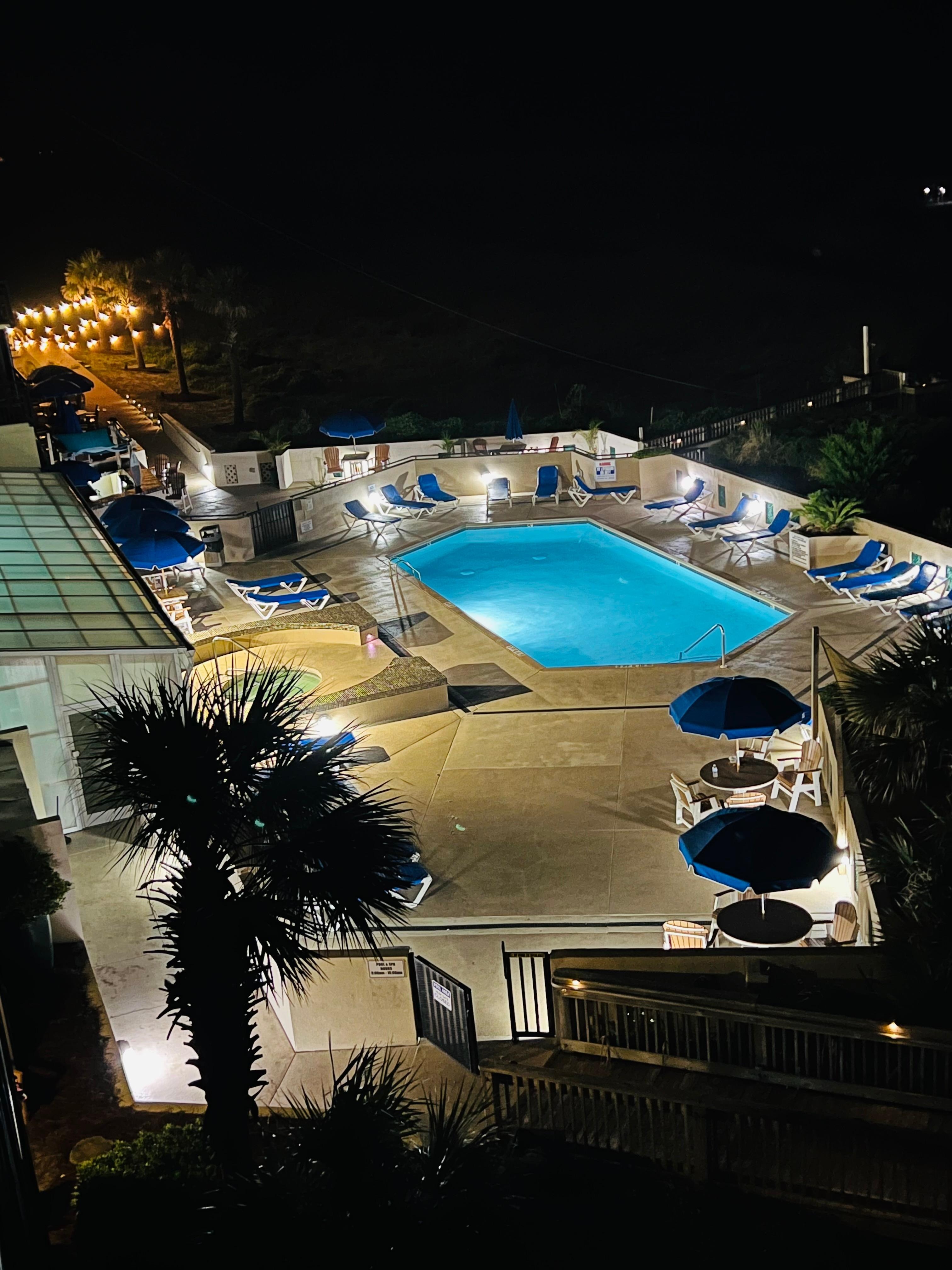 View of pool area from balcony.