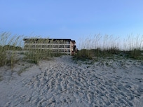 Building in back ground short walk thru bluffs to beach.