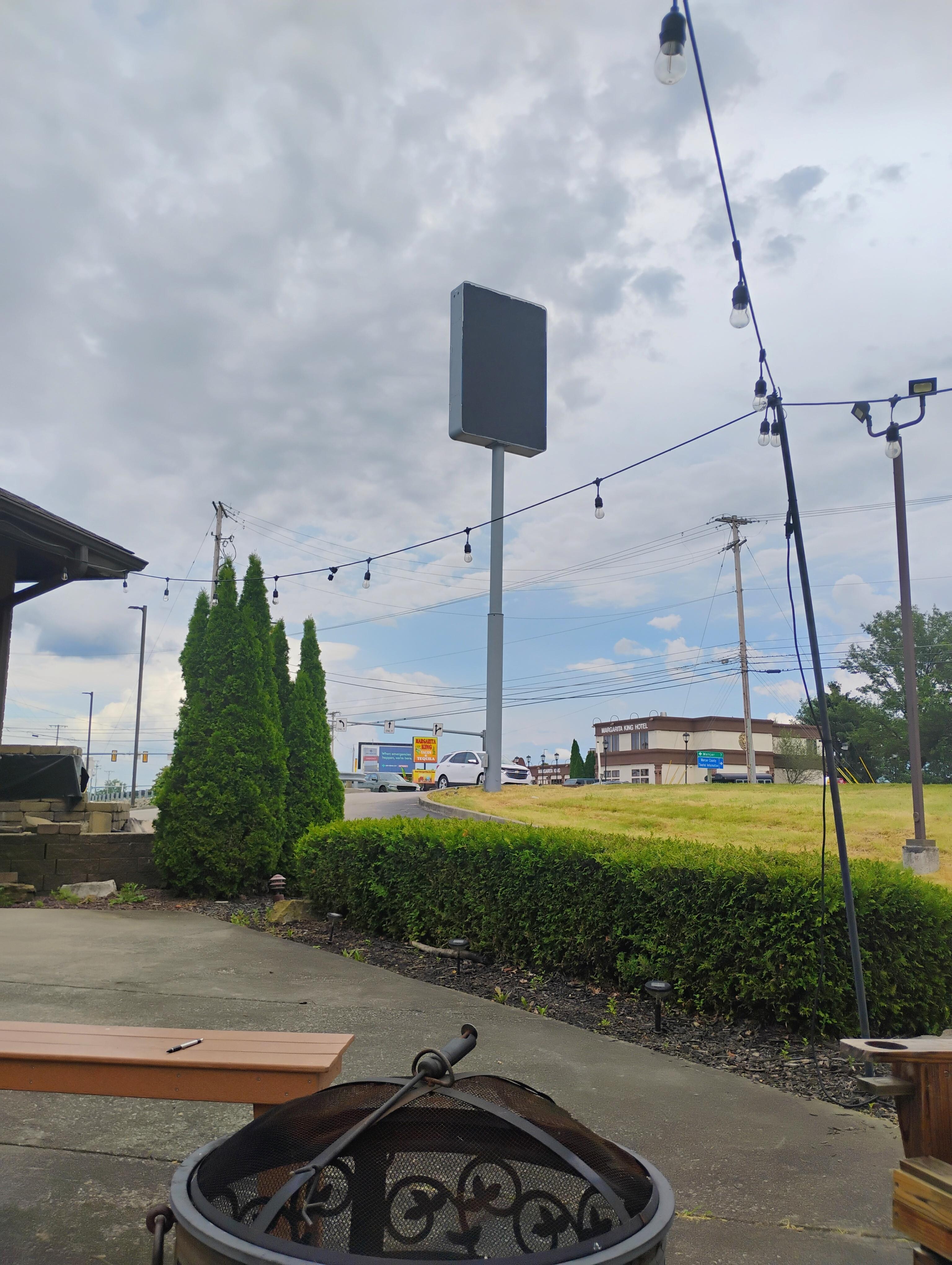 Blacked out sign and fire pit that is useless, outside lights also do not work 