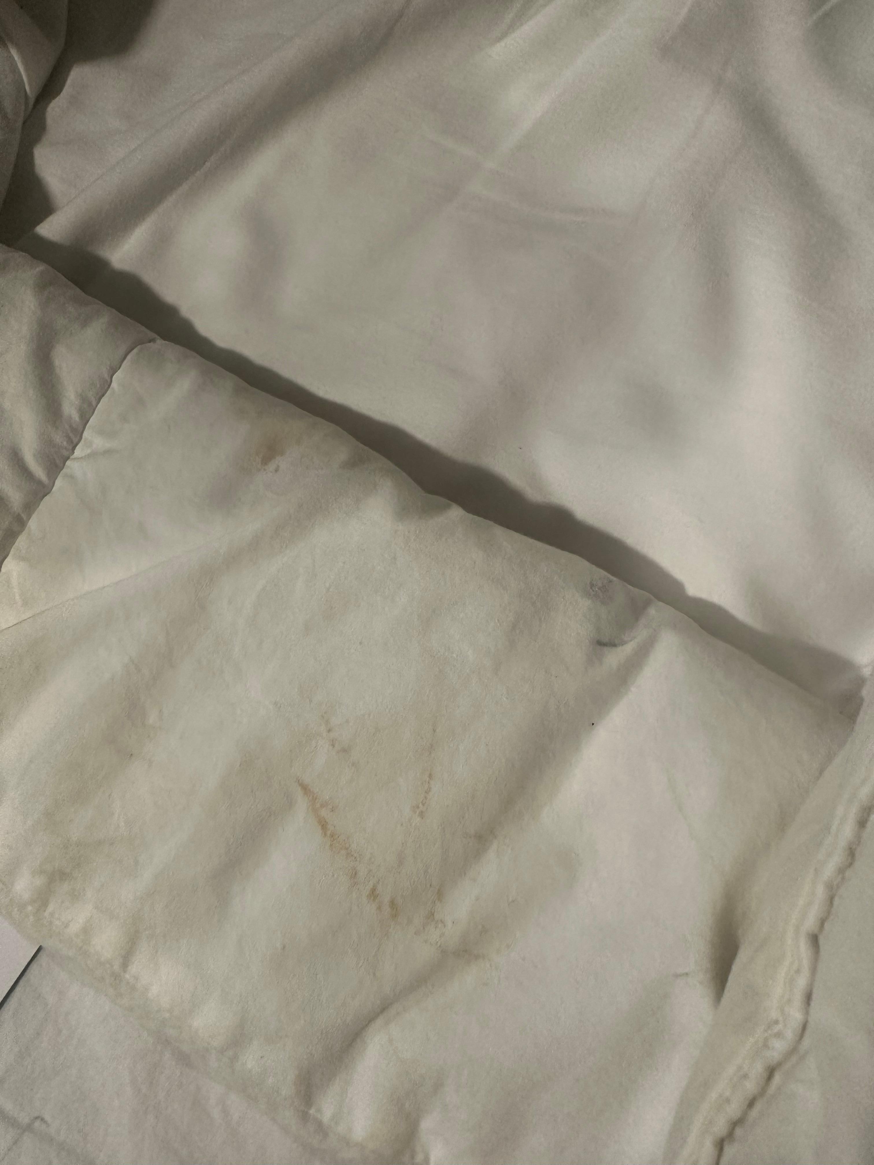 This part was tucked in under the bed mattress 