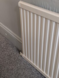 Radiator fallen off wall