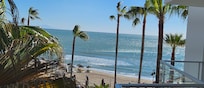 Very short walk to the beach from the pool area