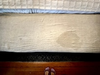 The bench in front of the bed also included a giant bonus stain.