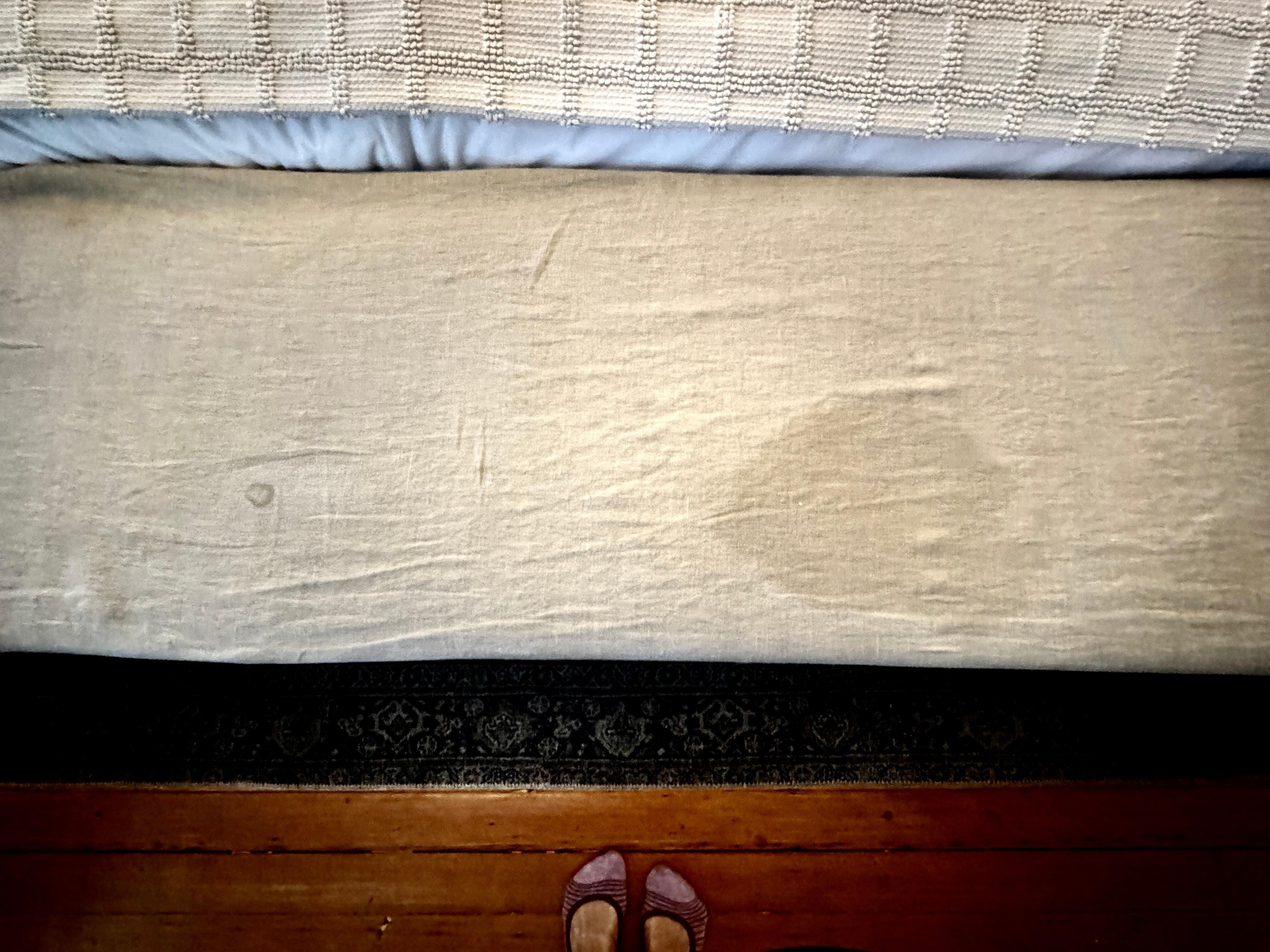The bench in front of the bed also included a giant bonus stain.