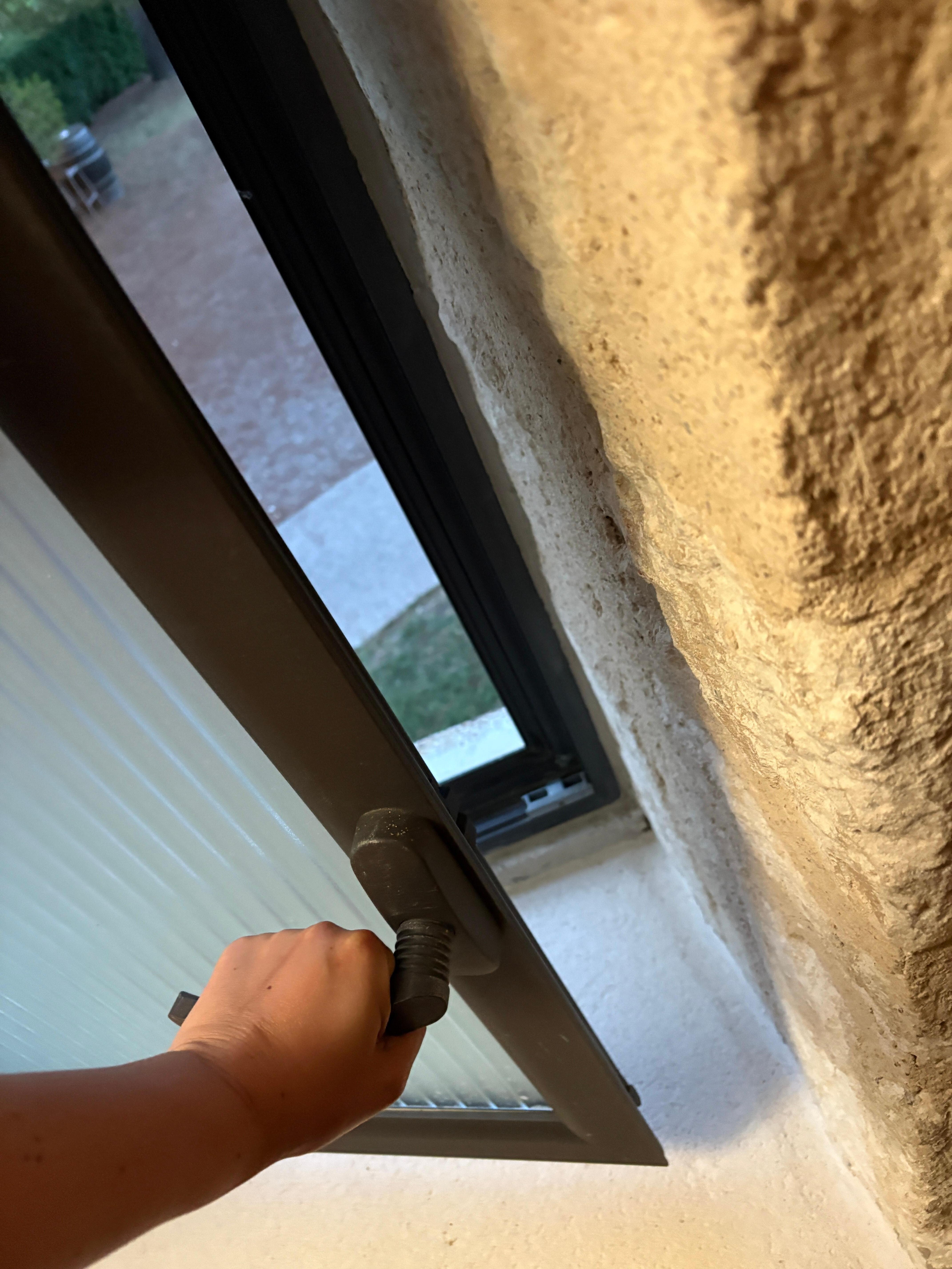 Floor level window with no lock. Extremely dangerous if you have kids.
