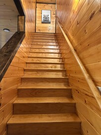 The steps to the four bedrooms upstairs