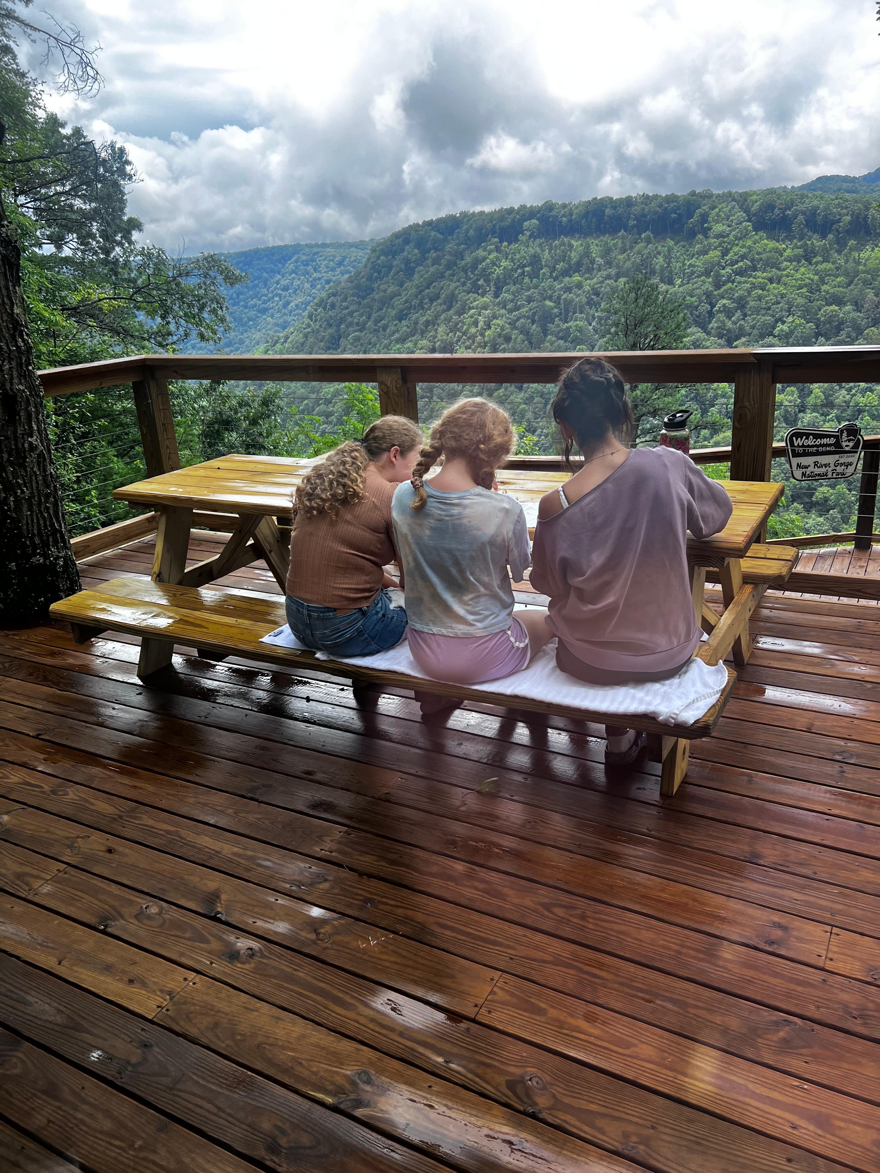 Crafting on back deck overlooking the gorge