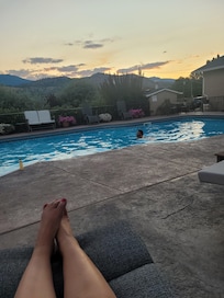 Unwind at the pool with a book