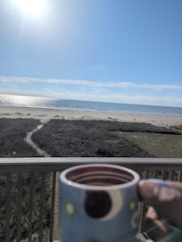 Enjoying the view with a cup of Joe.