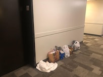 Trash in hallway from the day before that was not picked up until 11 am the next day!