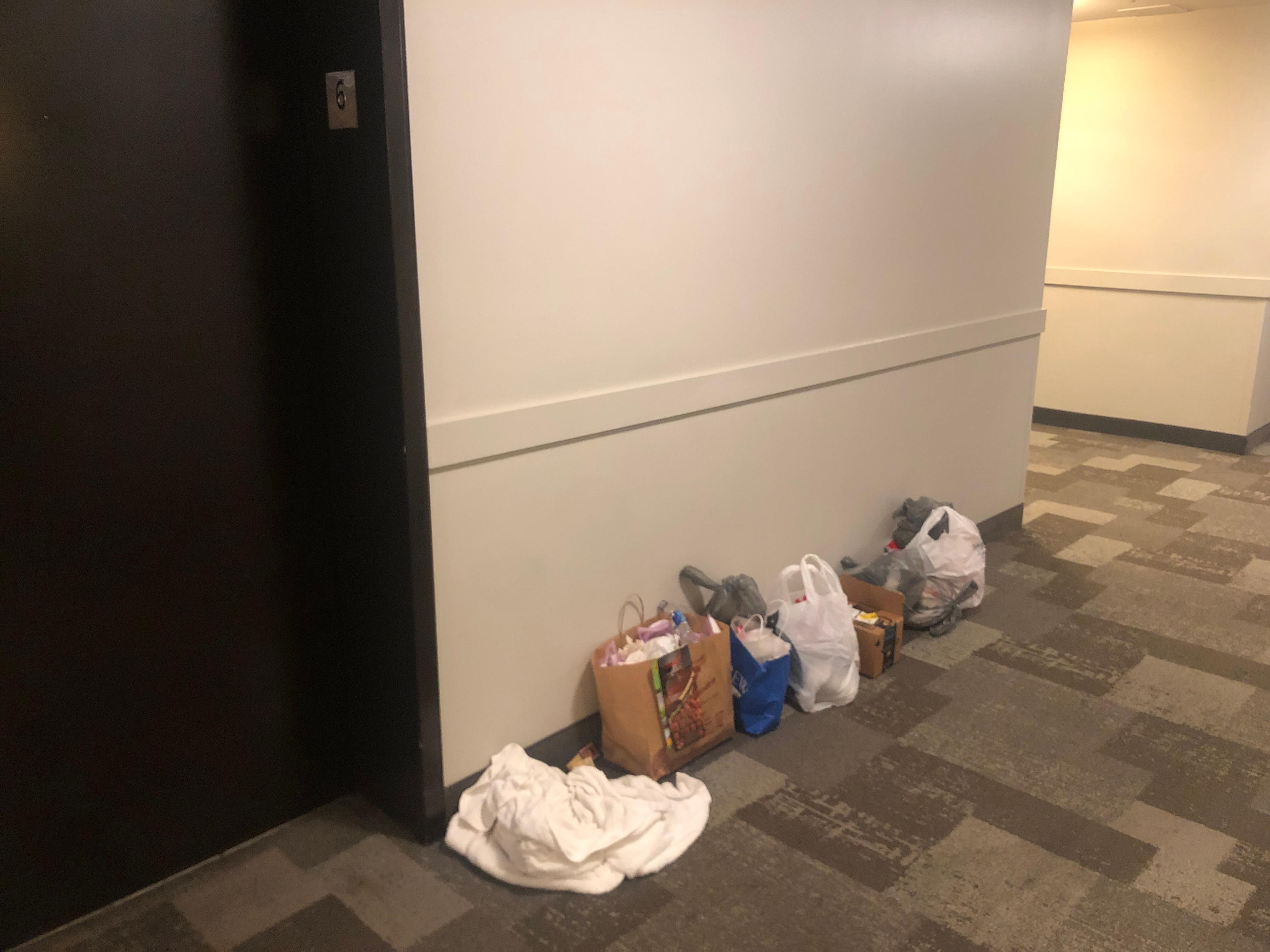 Trash in hallway from the day before that was not picked up until 11 am the next day!