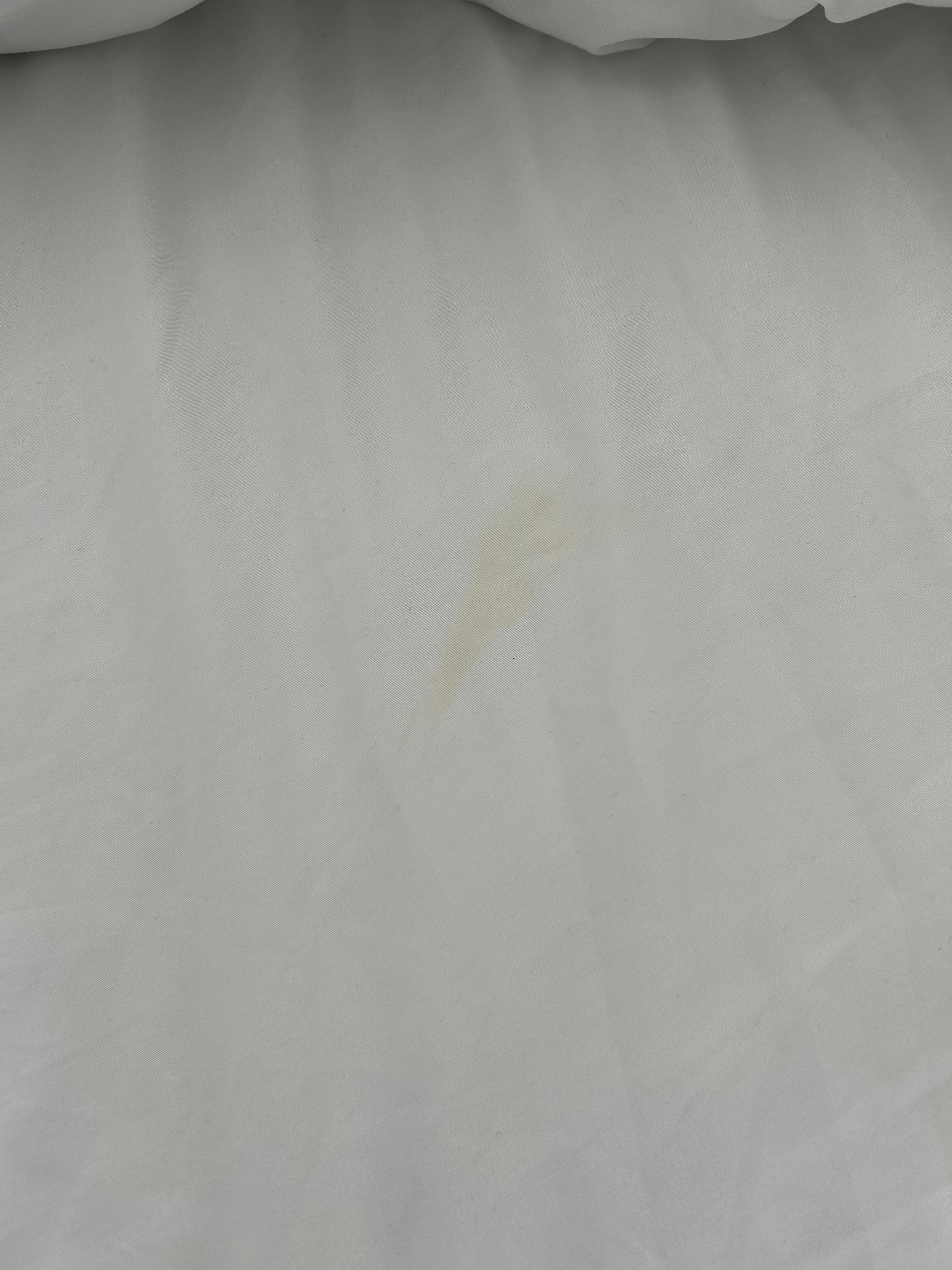 Yellow stain on sheet