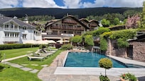 Outdoor heated pool. Sauna just out of view.
