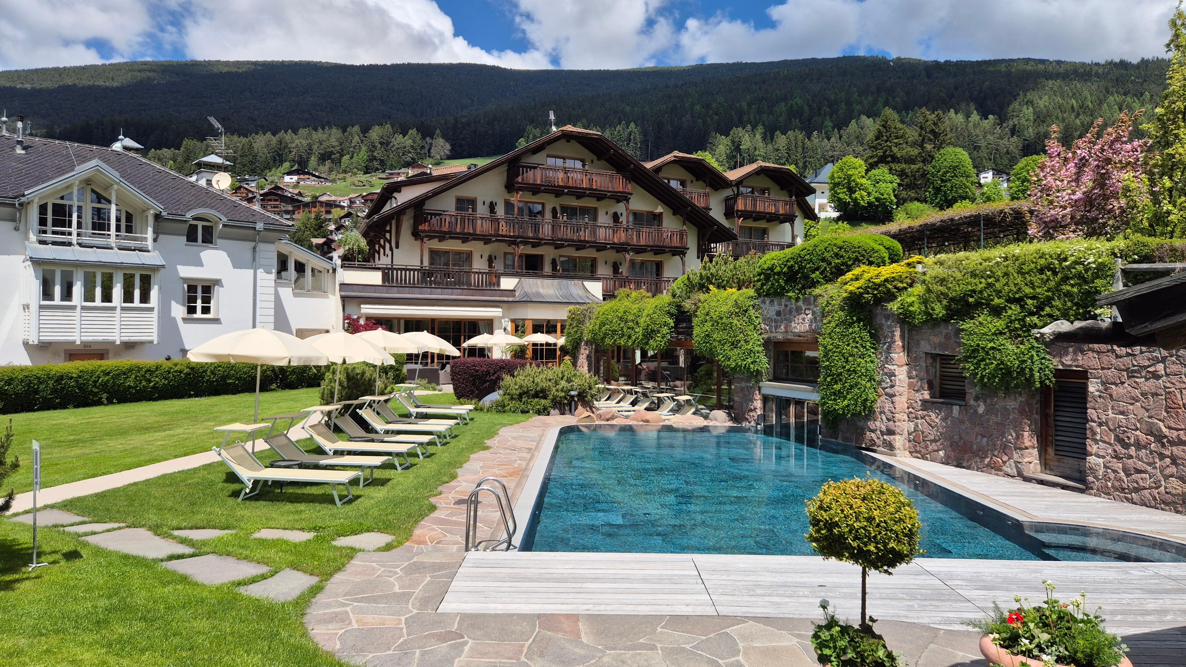 Outdoor heated pool. Sauna just out of view.