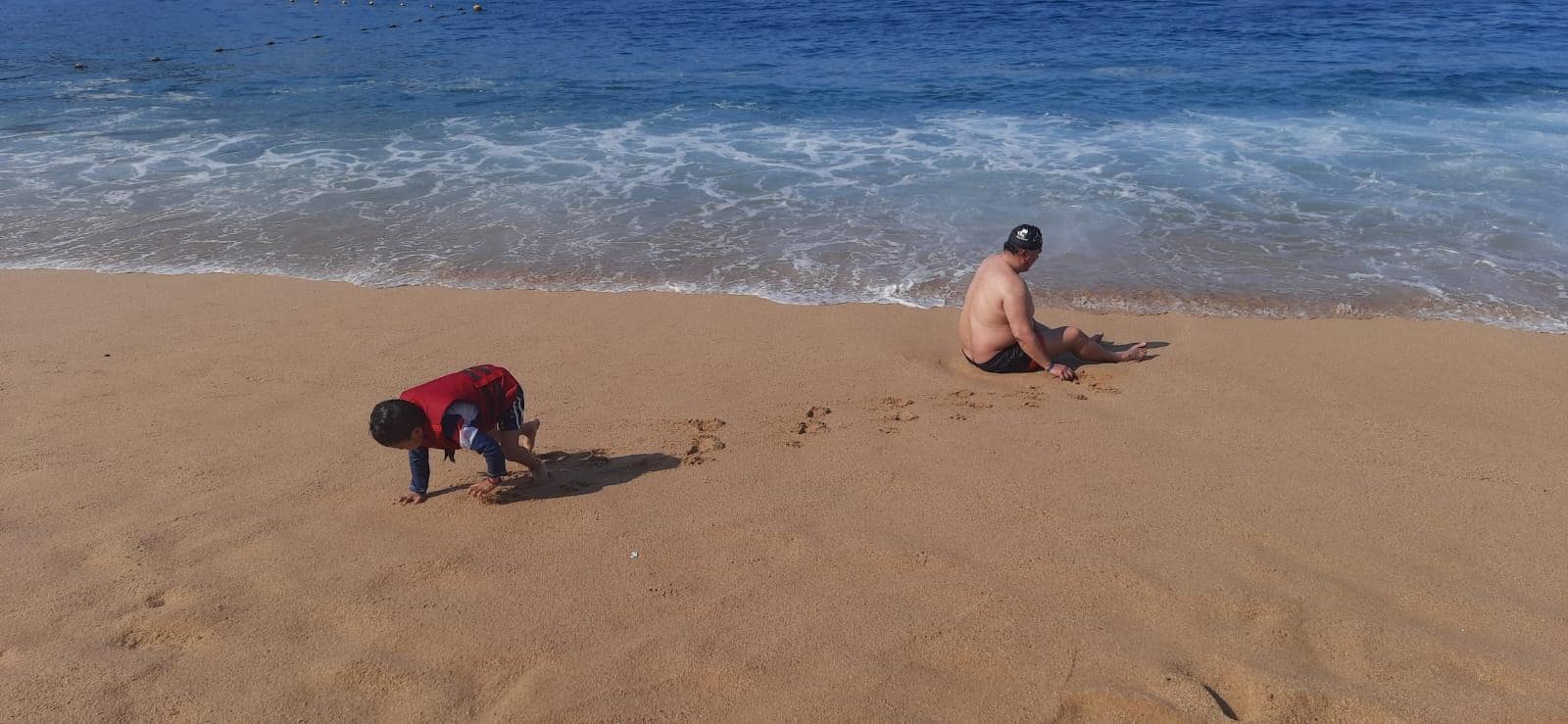 El acceso en la playa super