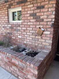 Entry to house very uninviting. Front planter just had hose and junk thrown in it. Mailbox just hanging