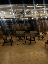 Just a small area of the dual level terrace on the roof. Nice breeze on a hot night.