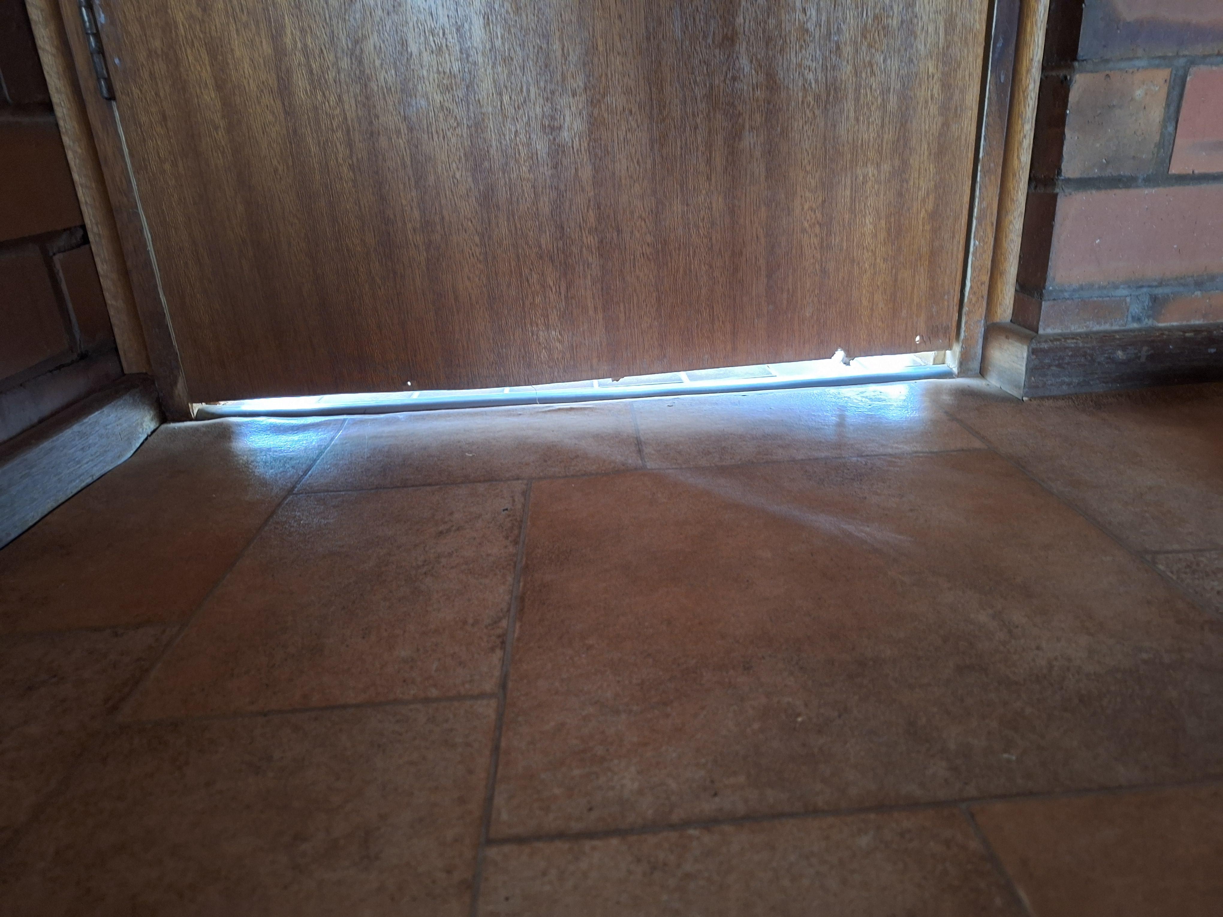 Weather strip off door left room for bug or snake entry