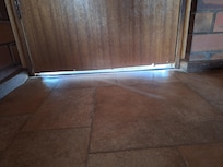 Weather strip off door left room for bug or snake entry