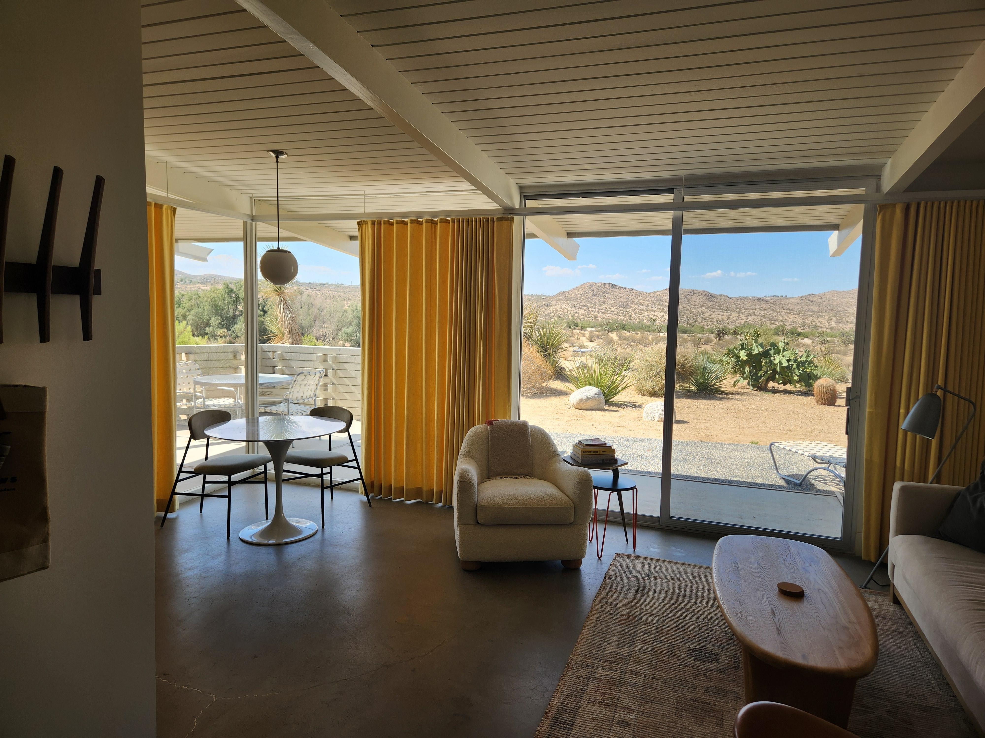 Living area with floor to ceiling windows