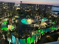 View of pool/lazy River at night