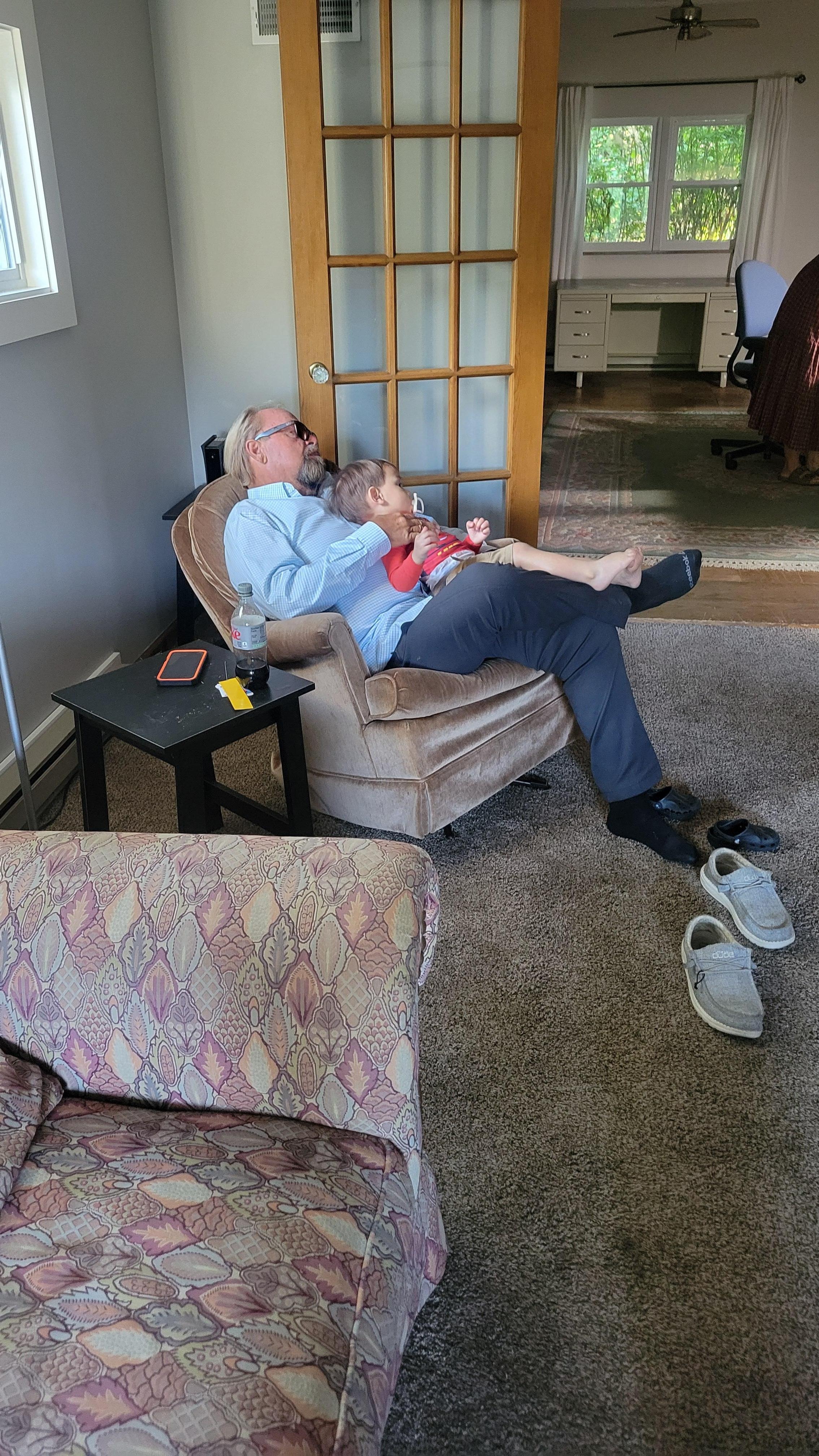 Papaw napping with our grandson James