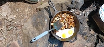Open fire fried potatoes and eggs
 don't get much better than this